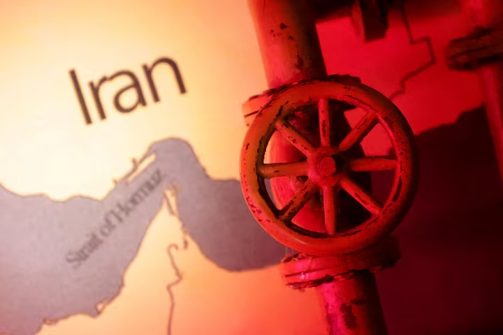 a-map-showing-the-strait-of-hormuz-and-iran-is-seen-behind-a-3d-printed-oil-pipeline-in-this-illustr.jpg