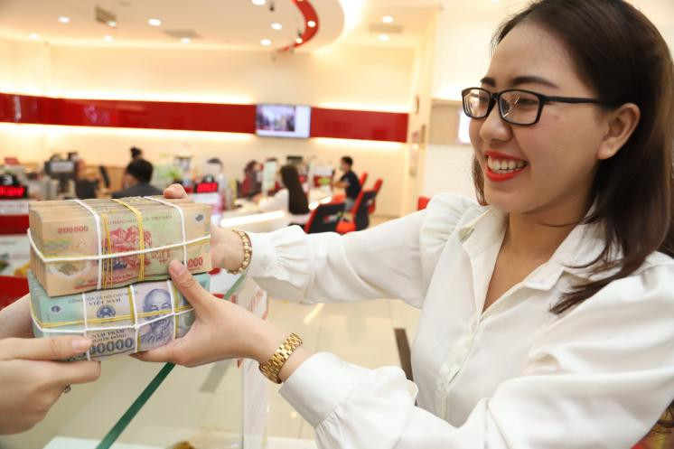 Chi phí vốn và trích lập dự phòng rủi ro tín dụng là những yếu tố ảnh hưởng đến lợi nhuận ngân hàng. Tác giả: Minh Khuê